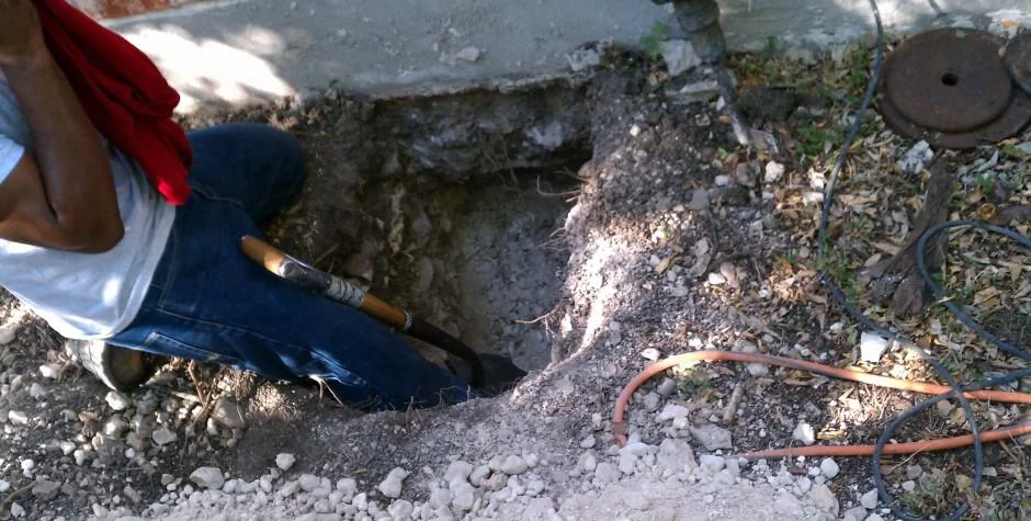 An exposed structural foundation beam during repair work